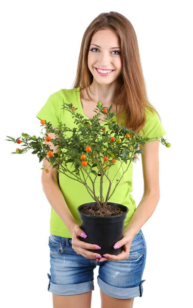 Mooi meisje met bloem in pot geïsoleerd op wit — Stockfoto