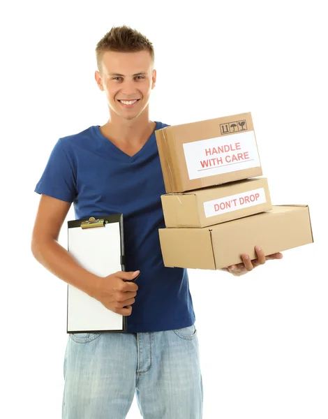 Giovane uomo di consegna con pacchi e appunti, isolato su bianco — Foto Stock