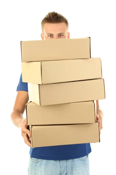 Young delivery man holding parcels, isolated on white — Stock Photo, Image