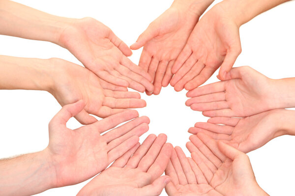 Ring of hands. Conceptual photo of teamwork, isolated on white