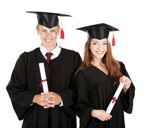 Two happy graduating students isolated on white Royalty Free Stock Images