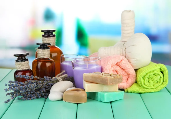 Still life with lavender candle, soap, massage balls, soap and fresh lavender, on bright background — Stock Photo, Image