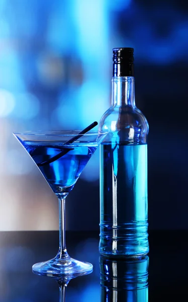 Glass of cocktail on bright background — Stock Photo, Image