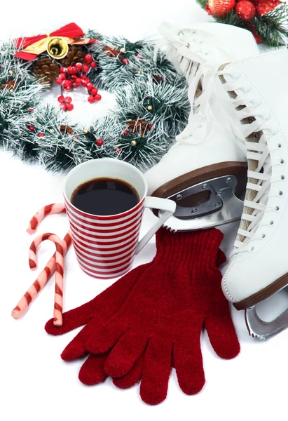 Figure skates with cup of coffee isolated on white — Stock Photo, Image