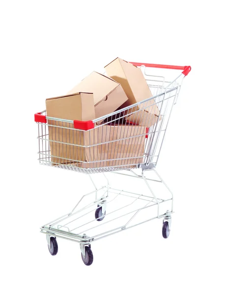 Shopping cart with carton, isolated on white — Stock Photo, Image