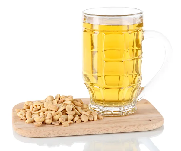 Beer in glass and nuts on on board isolated on white — Stock Photo, Image
