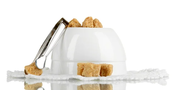 Unrefined sugar in white sugar bowl on white background — Stock Photo, Image