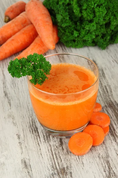 Fresh carrot juice on table close-up — Stock Photo, Image