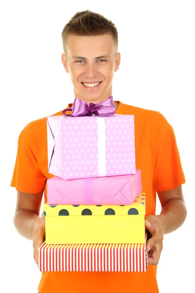 Joven sosteniendo regalos, aislado en blanco —  Fotos de Stock