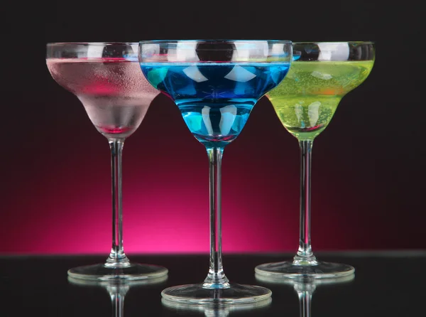 Cocktails on dark color background — Stock Photo, Image