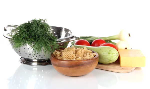 Ingredients for cooking pasta isolated on white — Stock Photo, Image