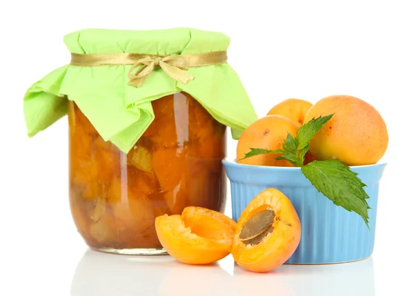 Apricot jam in glass jar and fresh apricots, isolated on white — Stock Photo, Image