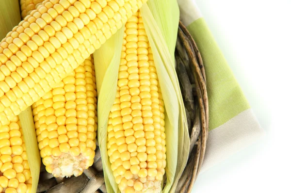 Crude corns on wicker tray isolated on white — Stock Photo, Image