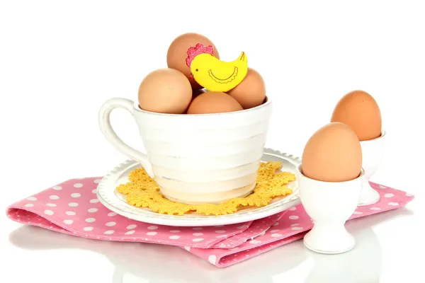 Eggs in different crockery isolated on white — Stock Photo, Image