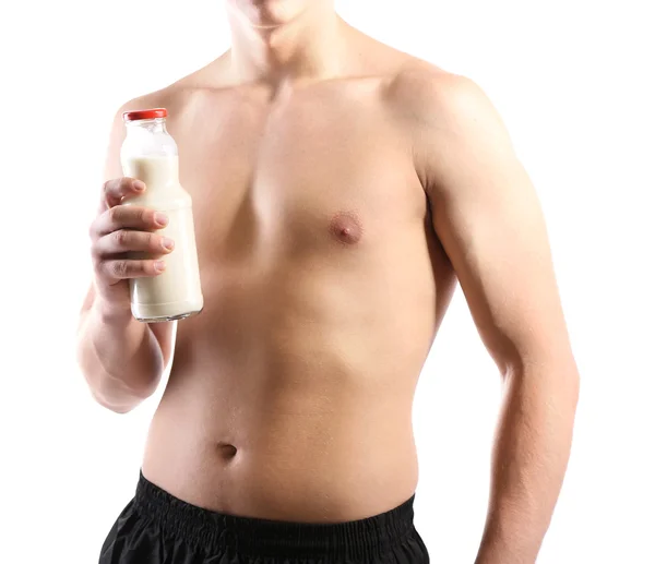 Bello giovane sportivo muscoloso con bevanda proteica, isolato su bianco — Foto Stock