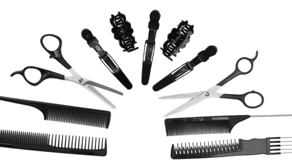 Professionelle Friseurwerkzeuge isoliert auf weiß — Stockfoto