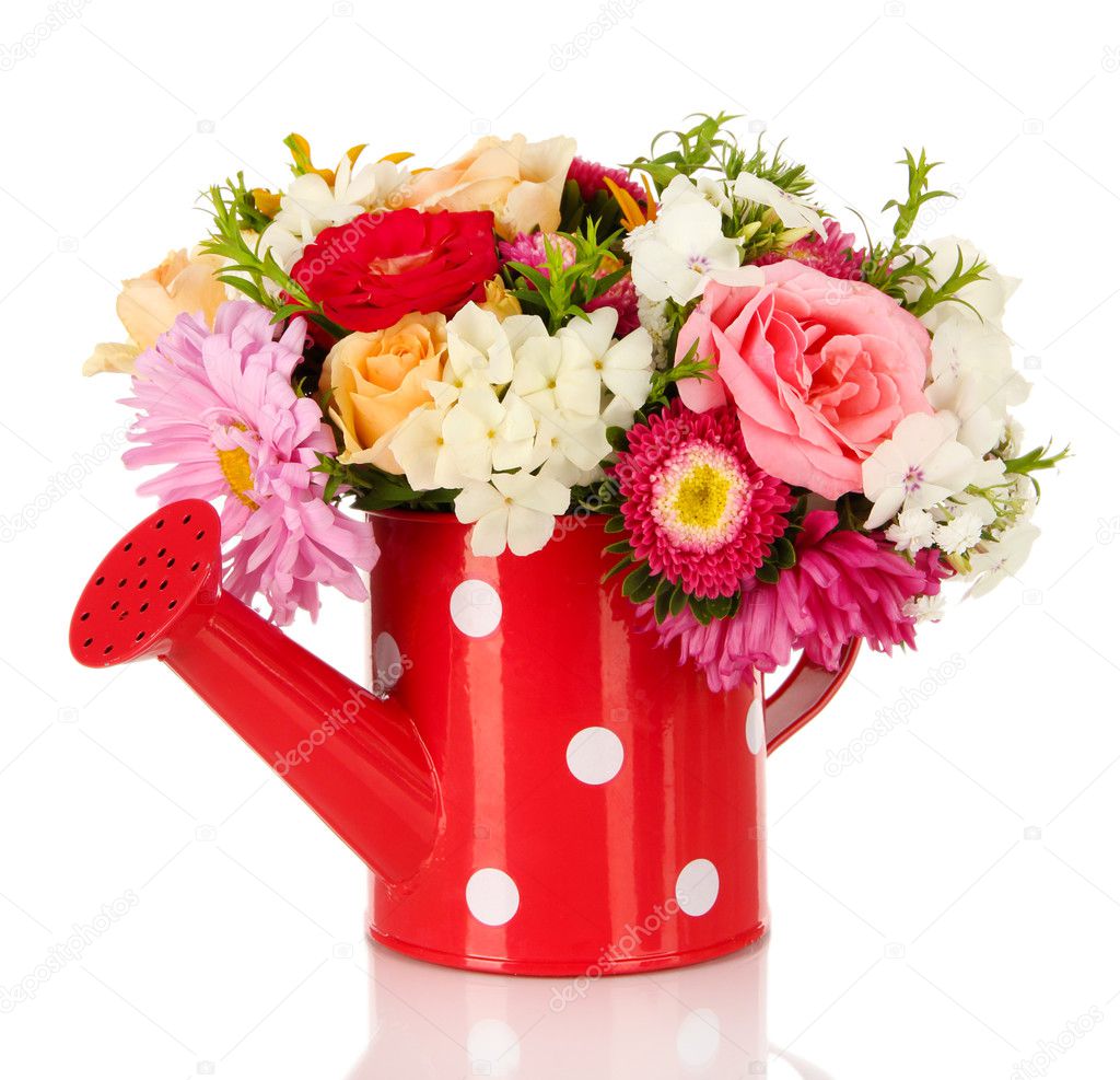 Beautiful bouquet of bright flowers in color vase, isolated on white