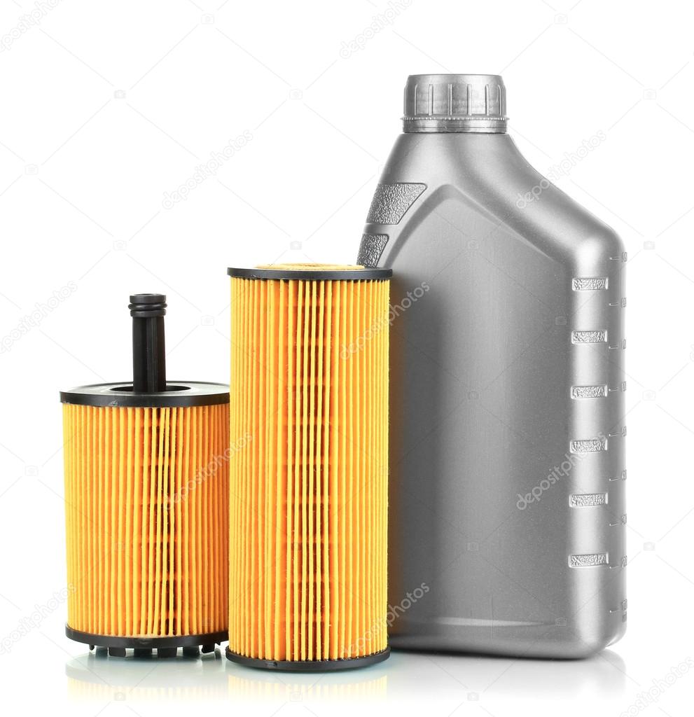 Car oil filters and motor oil can isolated on white