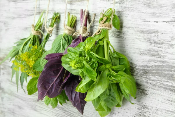 Fresh herbs on wooden background — Stock Photo, Image