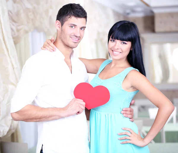 Beautiful young romantic couple in cafe — Stock Photo, Image