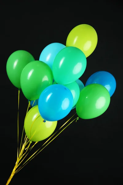 Colorful balloons isolated on black — Stock Photo, Image