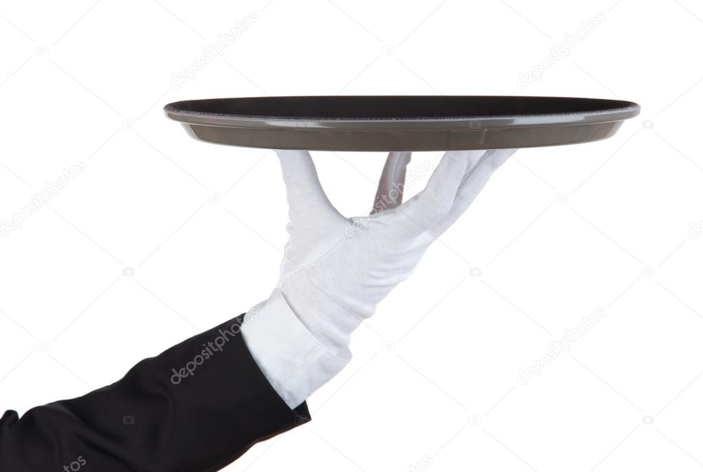 Empty tray in hand waiter isolated on white