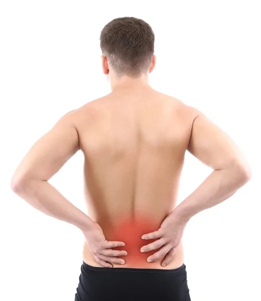 Hombre joven con dolor de espalda, aislado en blanco — Foto de Stock