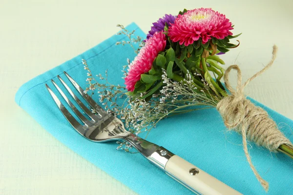 Festive dining table setting with flowers isolated on white — Stock Photo, Image