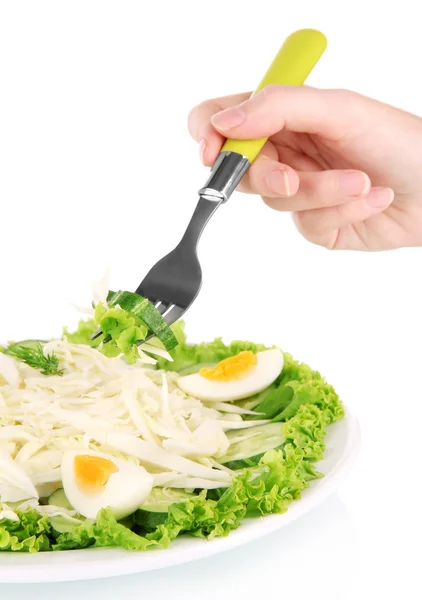 Mano donna con forchetta e gustosa insalata, isolata su bianco — Foto Stock