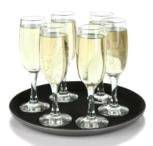 Many glasses of champagne on the tray, isolated on white — Stock Photo, Image