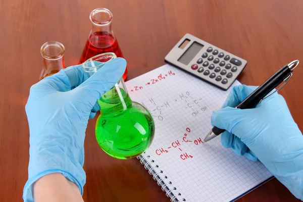 Hand scientist writing formulas — Stock Photo, Image