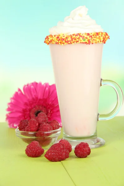 Delicious milk shake on table on light background — Stok Foto