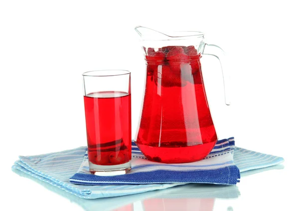 Pitcher and glass of compote on napkins isolated on white — Stock Photo, Image