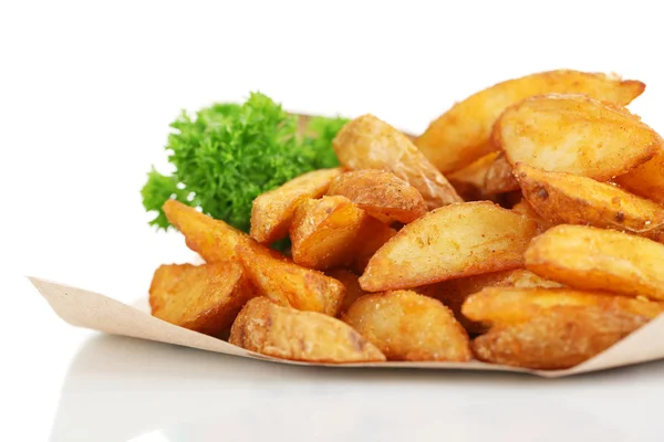 Patatas caseras sobre papel de calcar aisladas sobre blanco — Foto de Stock