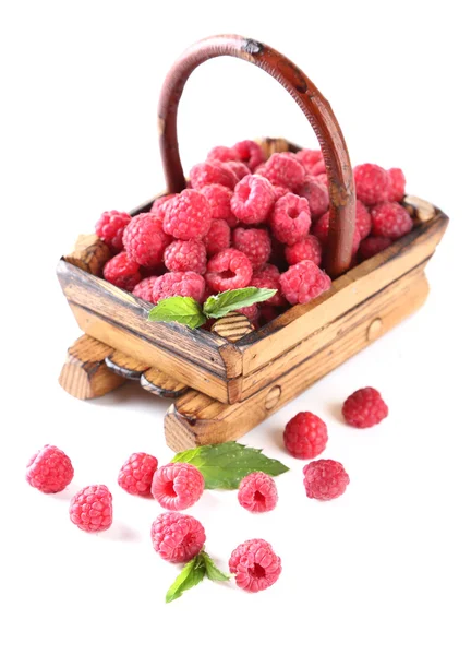 Ripe sweet raspberries in wooden basket, isolated on white — Stock Photo, Image