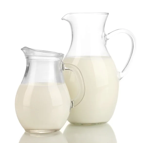 Milk in jugs isolated on white — Stock Photo, Image