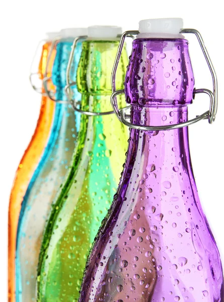 Botellas coloridas aisladas en blanco —  Fotos de Stock