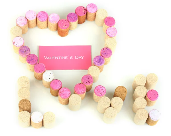 Wine corks laid out in form of heart isolated on white — Stock Photo, Image