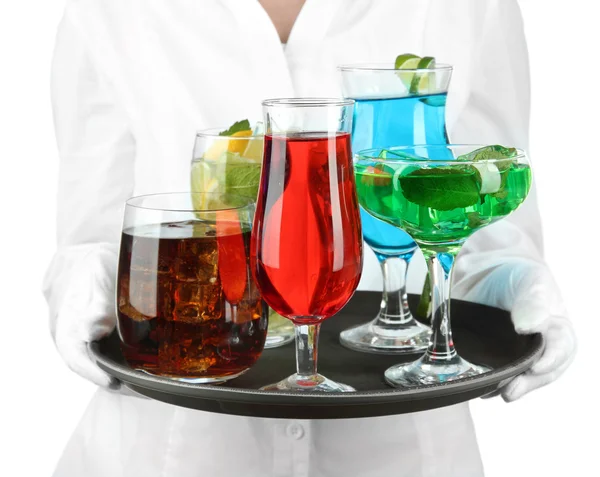 Waitresses holding tray with glasses of cocktails, isolated on white — Stock Photo, Image