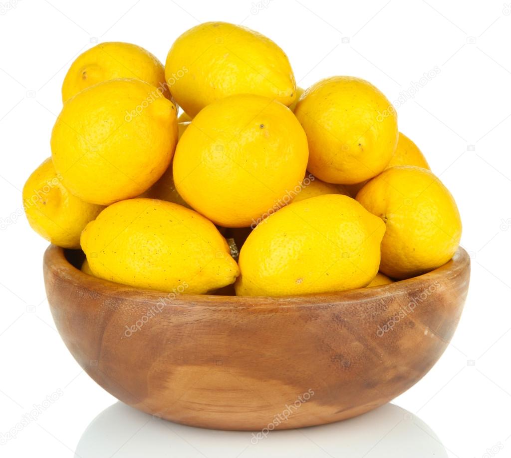 Ripe lemons in bowl isolated on white