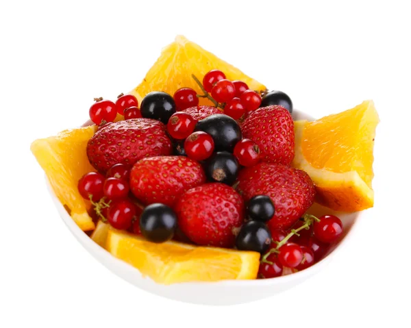 Useful fruit salad of fresh fruits and berries in bowl isolated on white — Stock Photo, Image