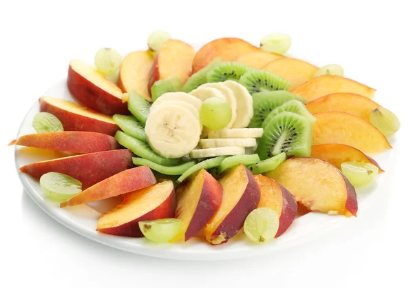 Assortment of sliced fruits on plate, isolated on white — Stock Photo, Image