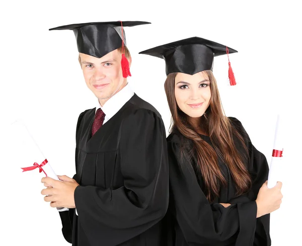 Due felici studenti laureati isolati su bianco — Foto Stock