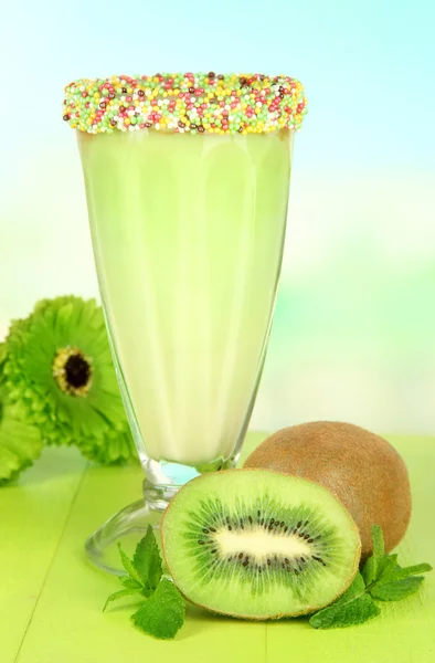 Delicious milk shake on table on light background — Stock Photo, Image