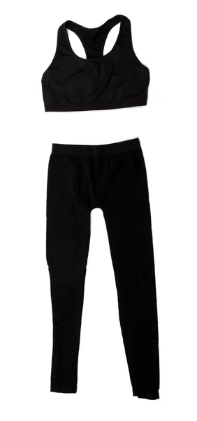 Pantalones deportivos de color y top, aislados en blanco —  Fotos de Stock