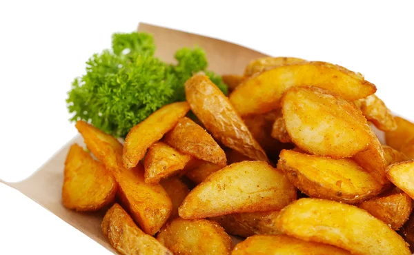 Patatas caseras sobre papel de calcar aisladas sobre blanco —  Fotos de Stock