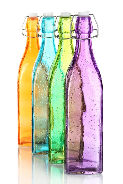 Botellas coloridas aisladas en blanco — Foto de Stock