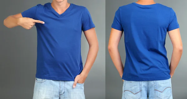 T-shirt op jonge man vooraan en achter op een grijze achtergrond — Stockfoto