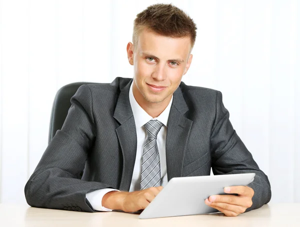 Portrait of young businessman working in office — Stock Photo, Image