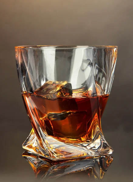 Glass of whiskey, on dark background — Stock Photo, Image
